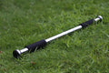 Steel adjustable pull-up bar extended to fit in a home door frame.