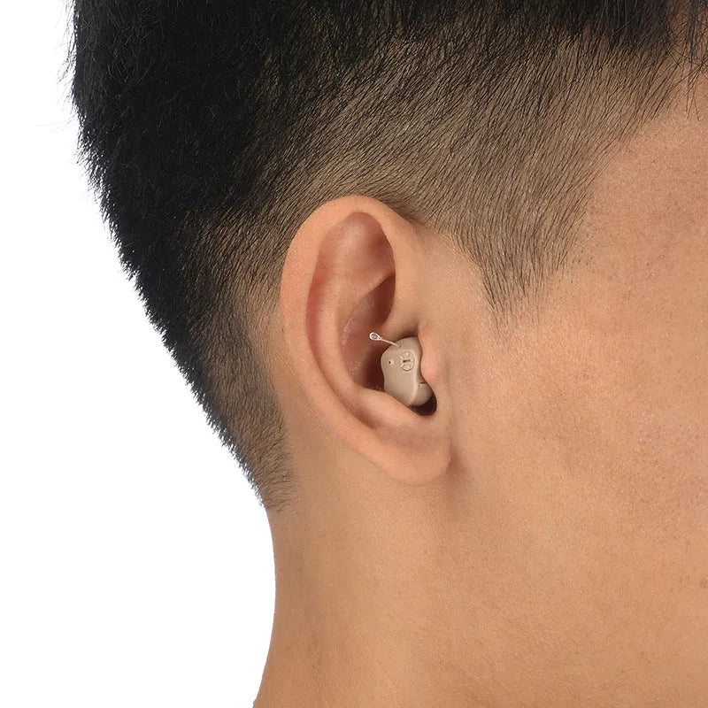 Rechargeable hearing aid with noise reduction in skin colour for single ear use elderly sound amplifier