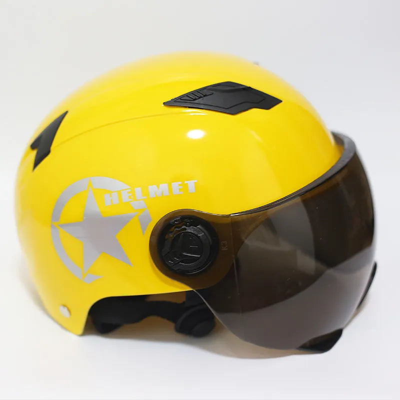 Breathable anti-collision electric car helmet with ABS shell and clear windshield on neutral background