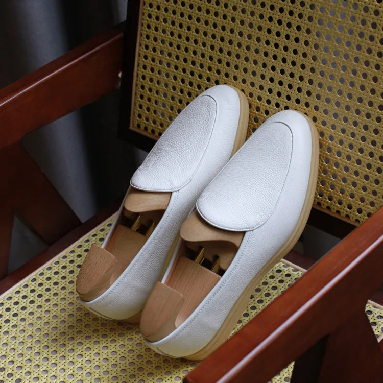 British handmade men's leather loafers in brown with a flat TPR sole