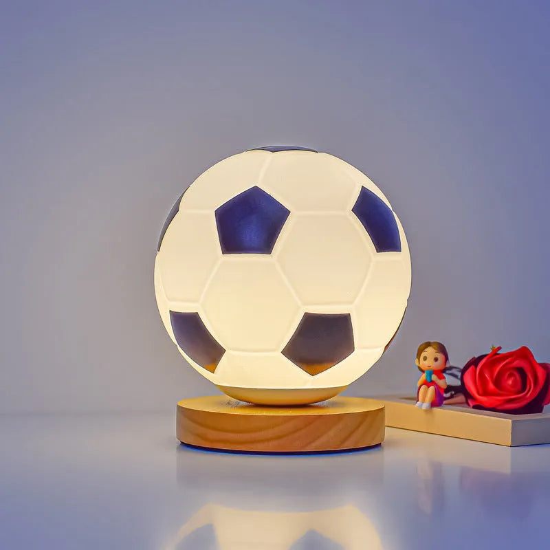 Football LED small glass night lamp with black and white football design on bedside table, USB powered, remote controlled