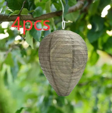 A rectangular photo colour beehive lantern with a honeycomb paper structure and wire frame.
