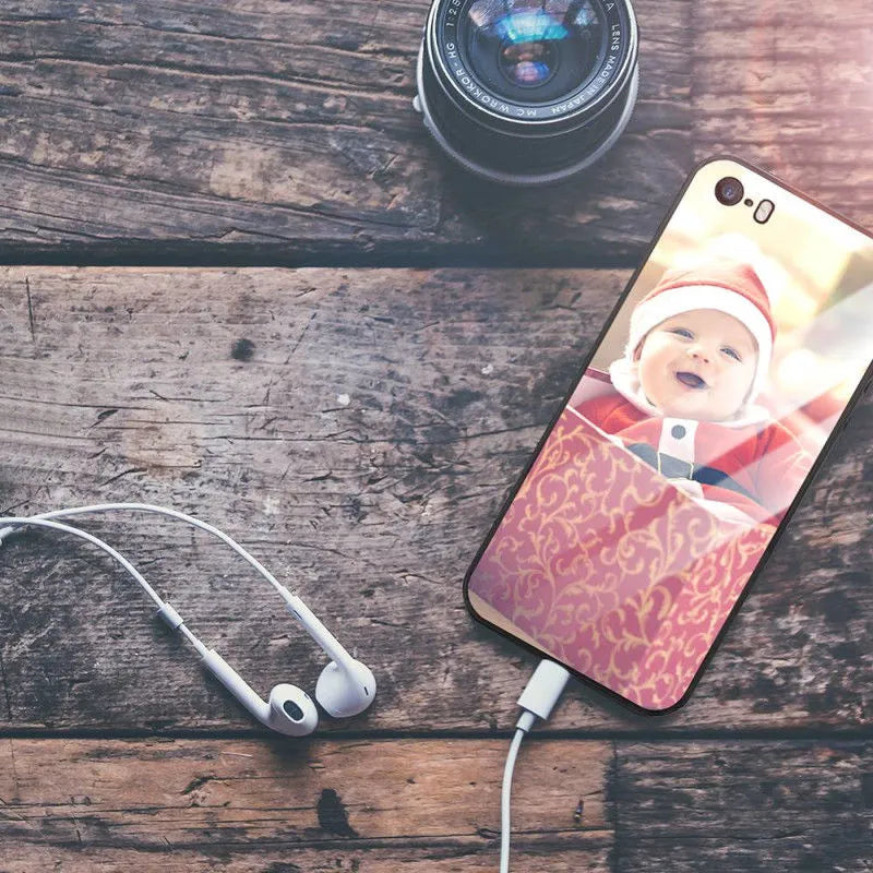 Ultra-thin iPhone case with raised bumper edge shown on an iPhone, highlighting camera and screen protection.
