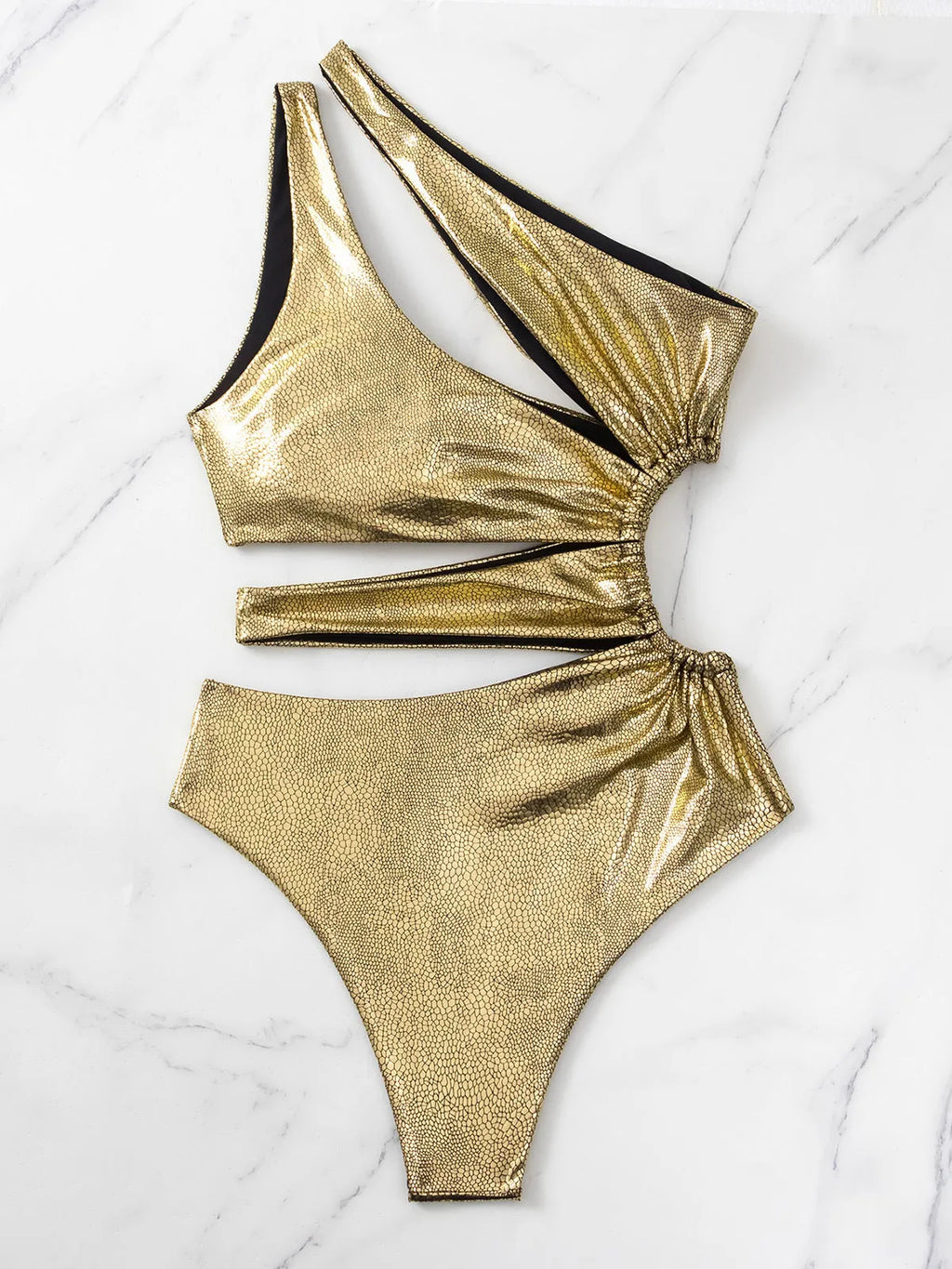 Women's gold backless one-piece swimsuit with spandex construction for swimming activities
