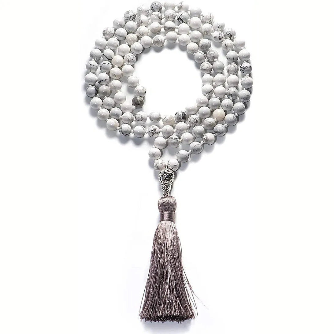 Long geometric agate tassel necklace showing colour options like Indian agate and lapis lazuli on a model.