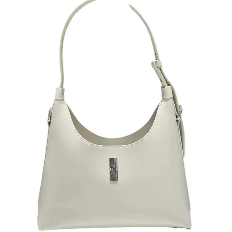 Genuine leather crossbody shoulder bag in dumpling shape with sandwich pocket design