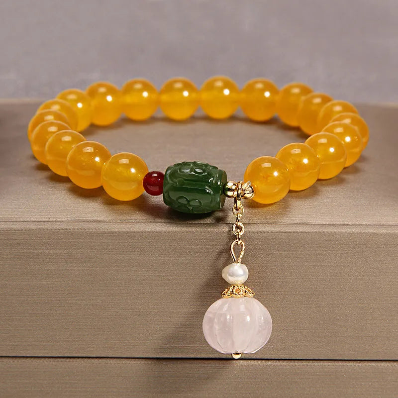 Women's yellow agate crystal bracelet with gold silk thread in khaki color