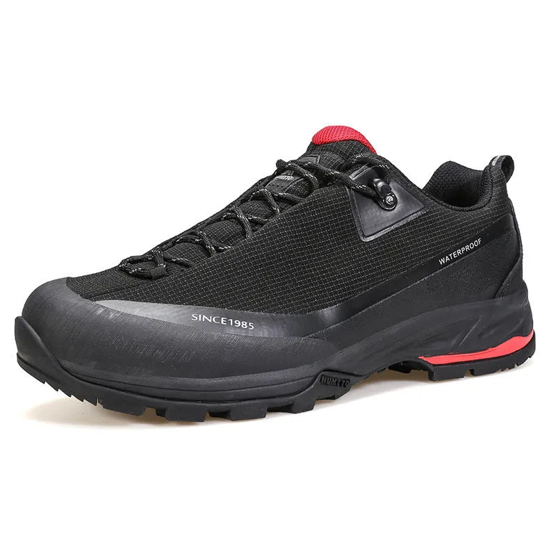 Men's low-top leather mesh hiking boots with front laces and a non-slip rubber outsole