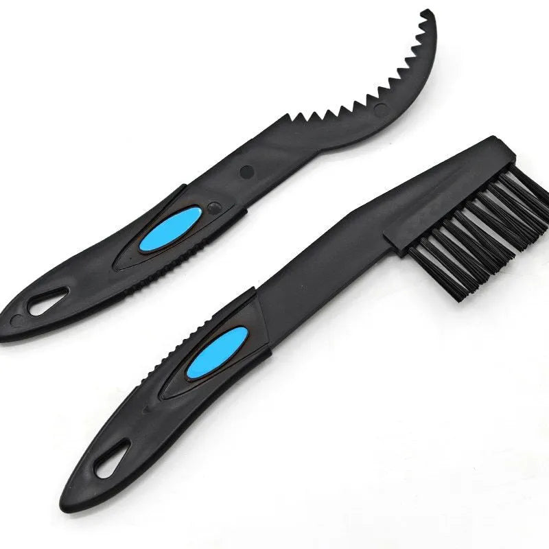 Blue plastic bicycle chain cleaning washer set with brushes on a bike chain