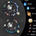 Two natural stone beaded zodiac bracelets with adjustable cords showing astrology symbols