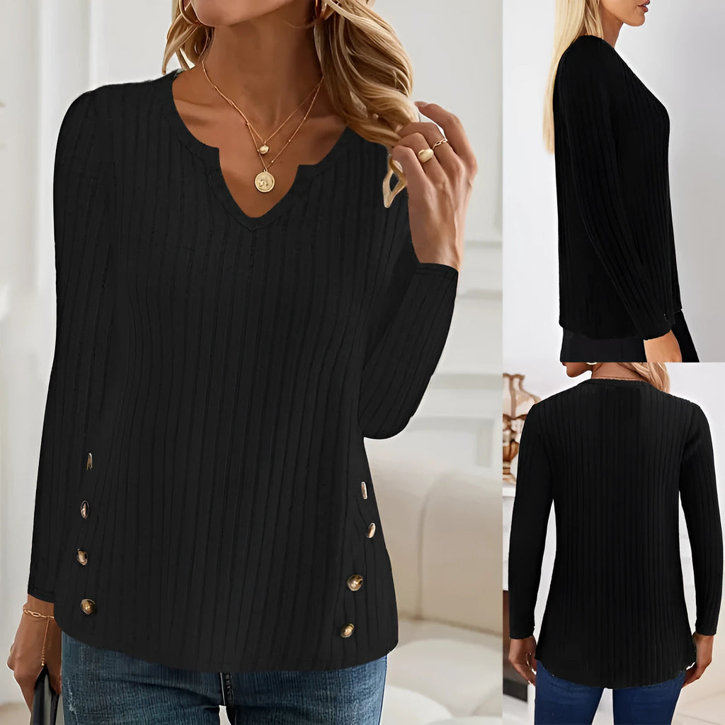 A solid colour casual knitted sweater with a button detail, shown in grey green.
