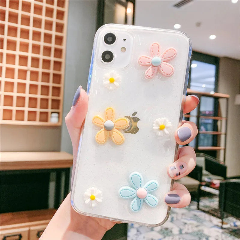 Soft rubber iPhone case with pink girl heart and New Year flower design on a white background.