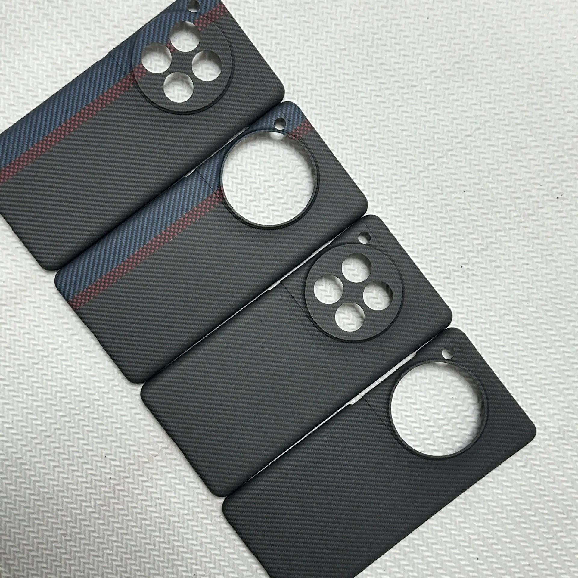 Black hand-woven Kevlar anti-wear phone case for OnePlus 12 with crater texture