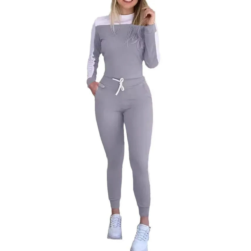 Women's colour-block long sleeve casual suit with pockets, polyester fibre, black colour option, front view on model