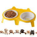 Ceramic cat food and water bowl set with elevated tilted stand in blue, pink, white, or yellow