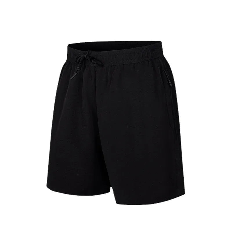 Men's quick-dry loose beach shorts in polyester fabric with micro-elastic waistband