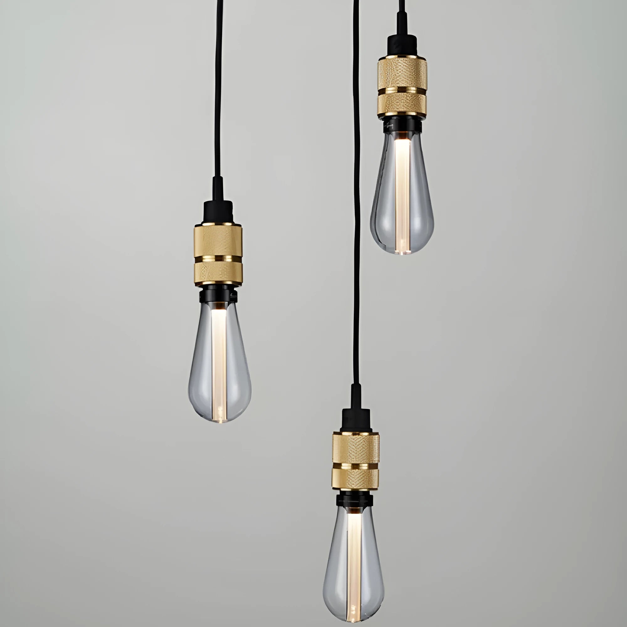 DIY retro chandelier assembly kit with metal lamp holder and braided power cord in chrome, gold, rose gold, and black.
