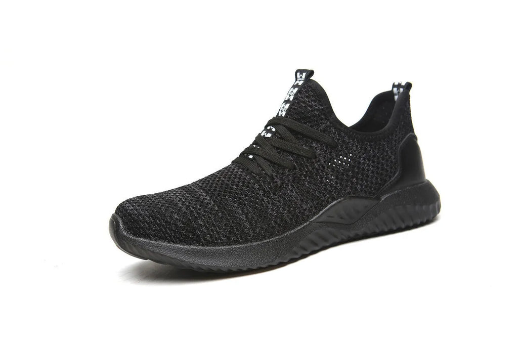 Black low-cut work safety shoes with a visible steel toe cap and textured EVA sole.