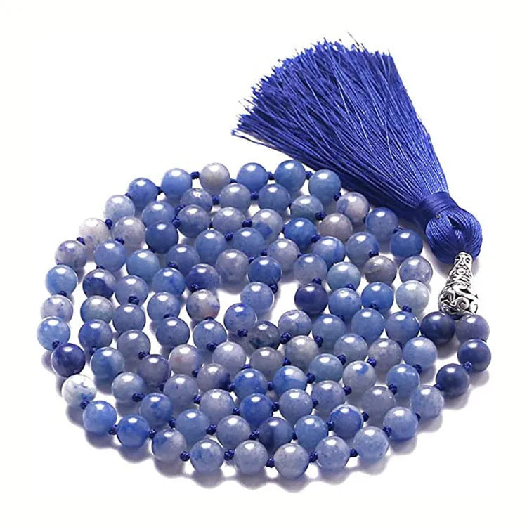 Long geometric agate tassel necklace showing colour options like Indian agate and lapis lazuli on a model.
