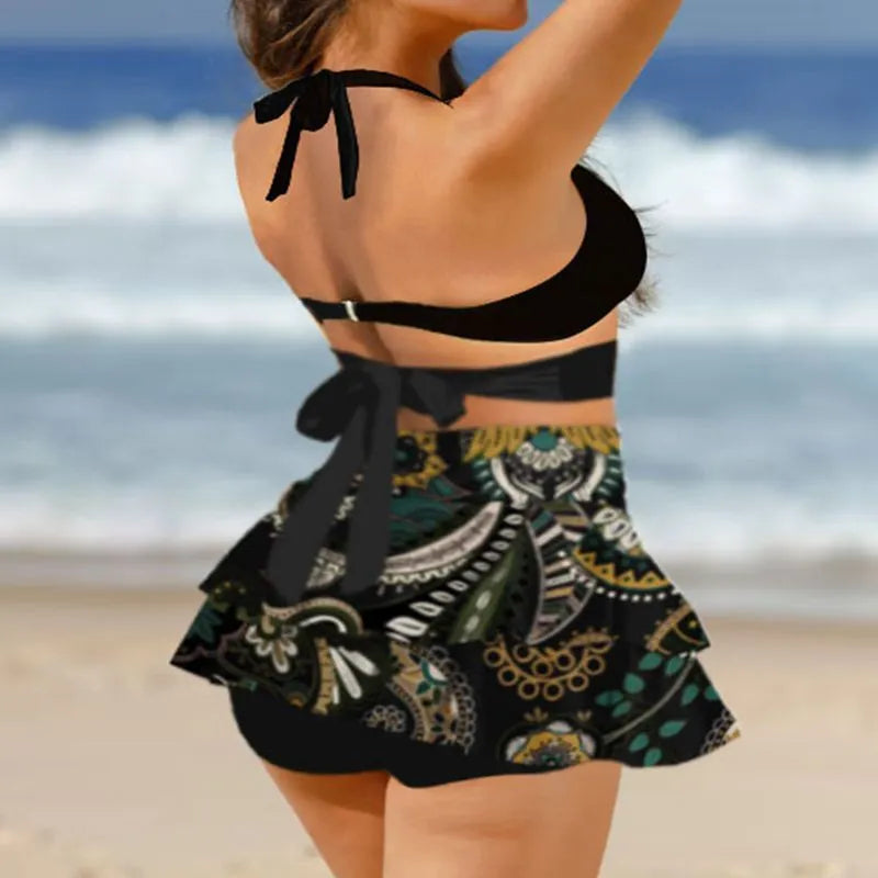 Women's purple bikini with matching skirt showing lace-up back design and high-waisted briefs