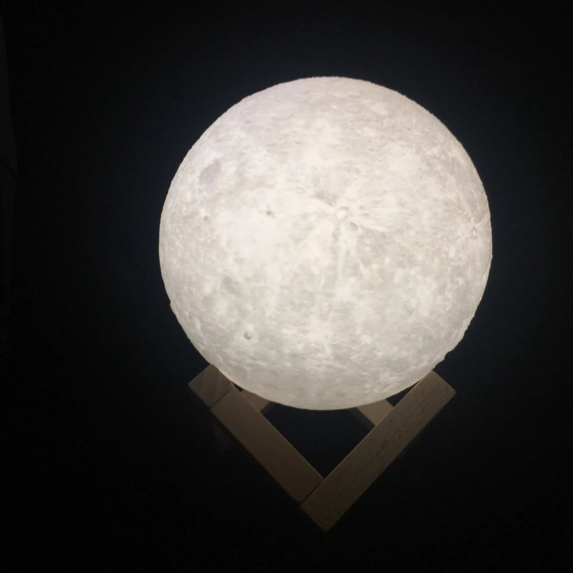 3D printed moon lamp with touch metal ring control on wooden stand, showing white and yellow light settings