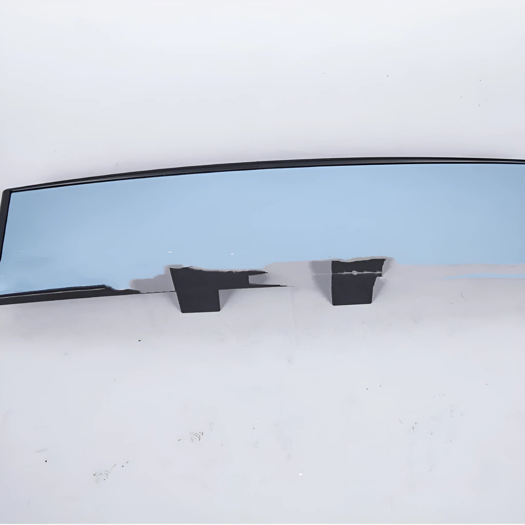 Curved blue filter rearview mirror measuring 270mm by 75mm with snap-on installation
