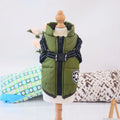 Waterproof dog coat with integrated harness in red, navy blue, or army green, shown on a dog.