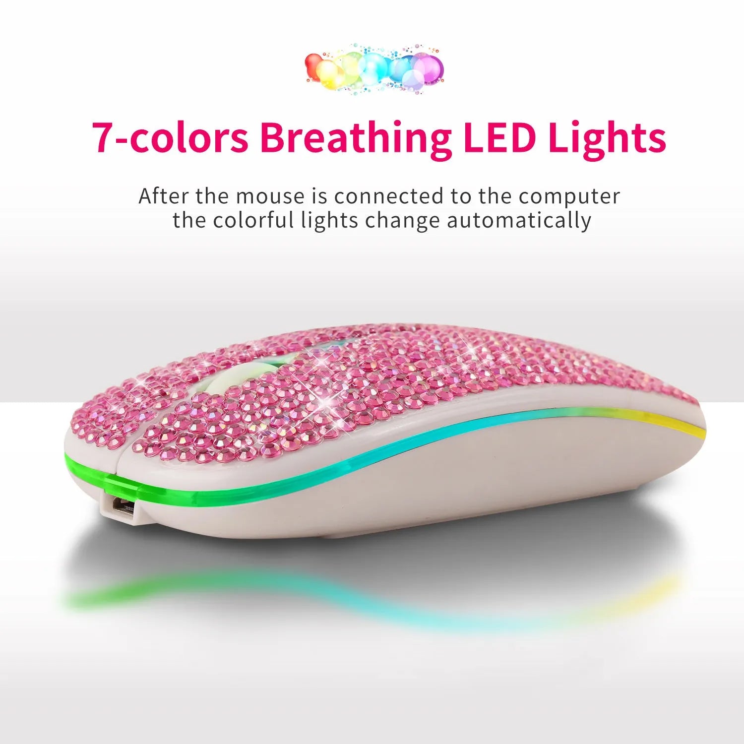 Rechargeable mute crystal rhinestone mouse in silver on desk, with USB charging cable