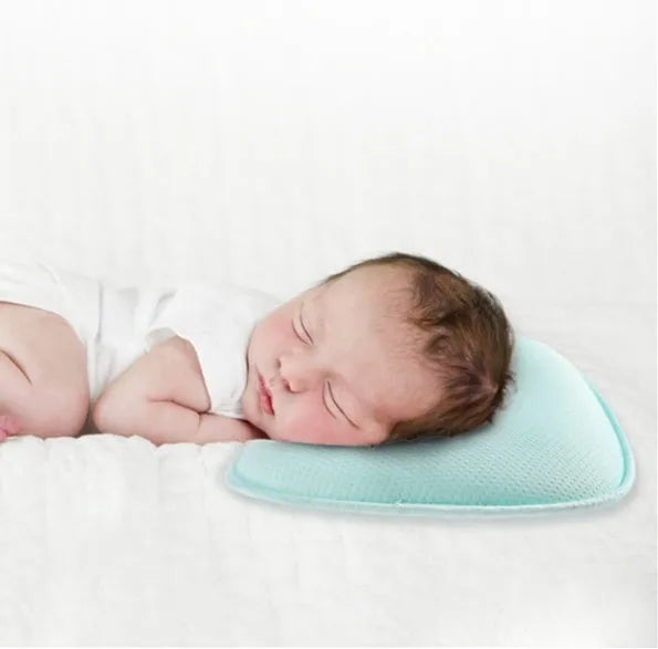 Sunveno baby head shaping pillow in blue with groove shape, corn fibre filling, 31x23cm, on white background