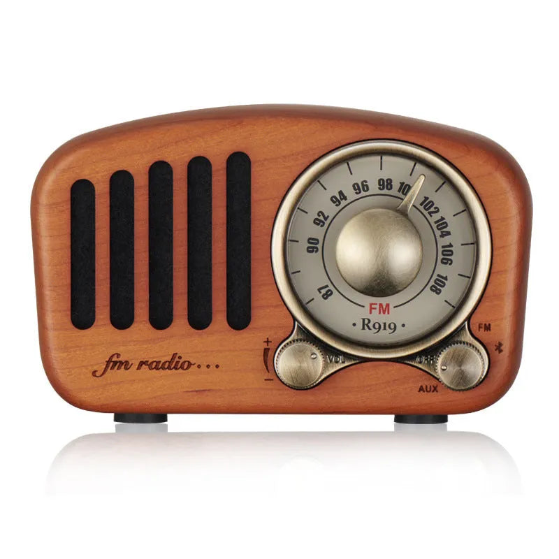 Retro wooden wireless mini speaker in cherry wood finish showing compact dimensions