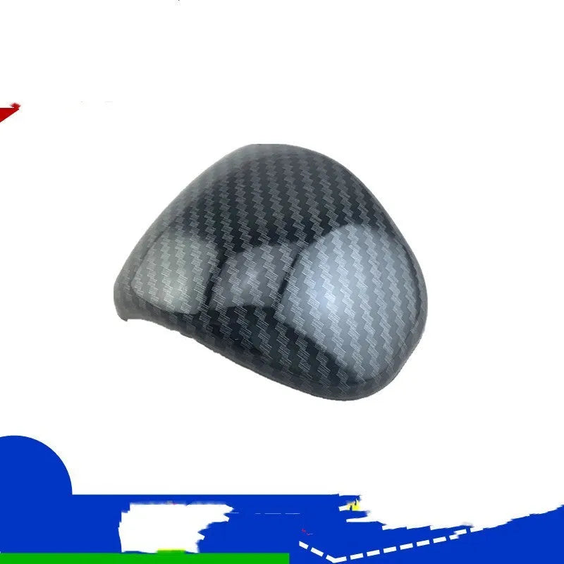 Smart RunK3 gear shift cover in carbon fibre pattern made from black ABS plastic.