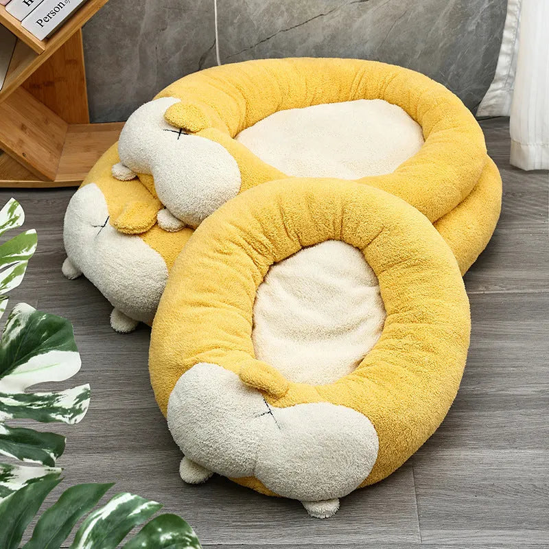 A soft plush corgi-shaped pet bed for dogs or cats, shown in three available sizes.