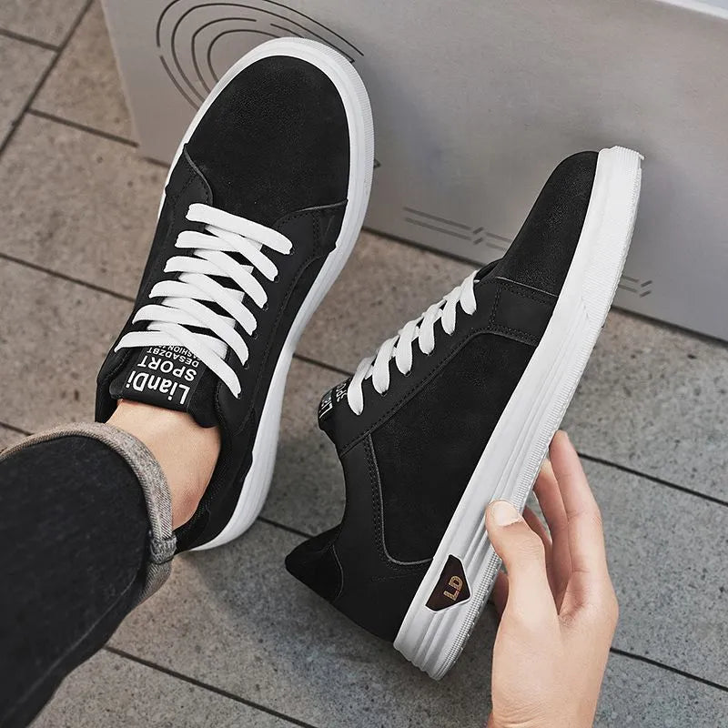 Men's black snake pattern PU leather sneakers with round toe and flat rubber sole.