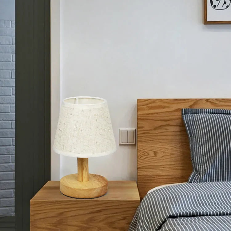 Vintage pleated table lamp with linen shade, jute trim, and bamboo holder showing three-colour dimming function