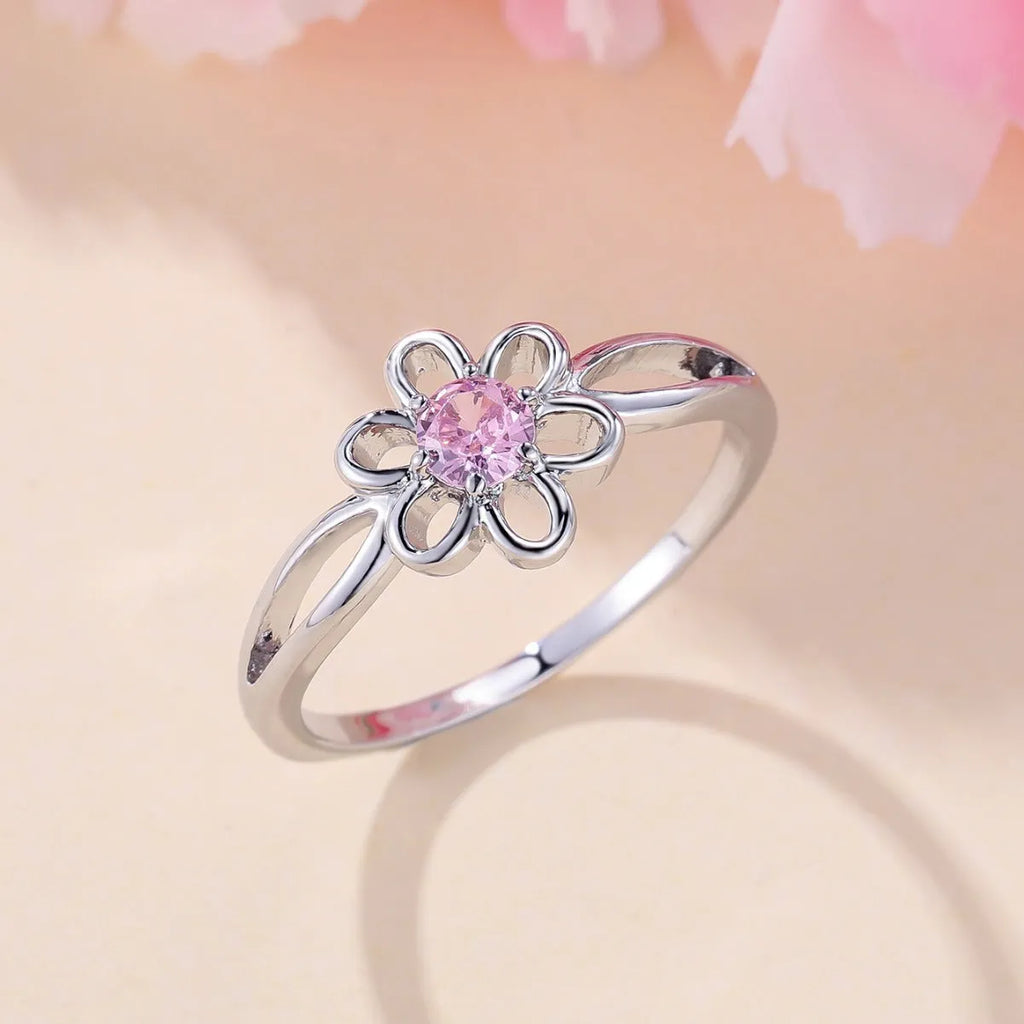Women's hollow flower design ring in platinum pink diamond colour with white gold powder accents