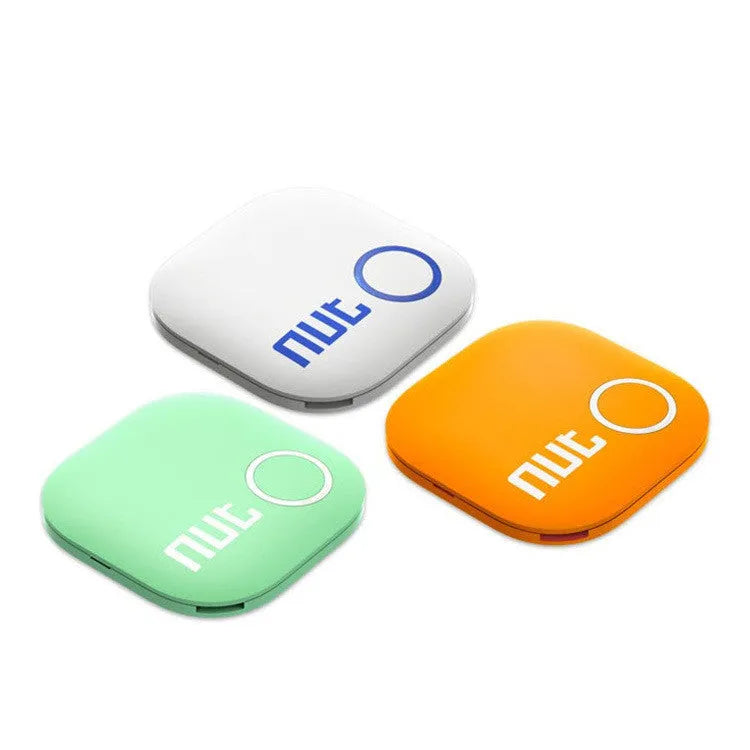 NUT2 generation anti-lost device in white, showing compact 36x36x5.8mm size and keyring attachment