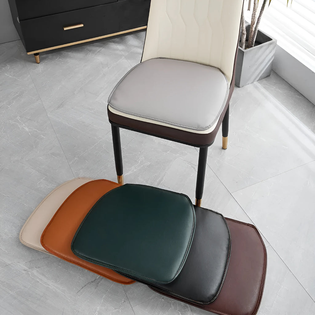Leather horseshoe-shaped seat cushion shown in a solid colour on a chair