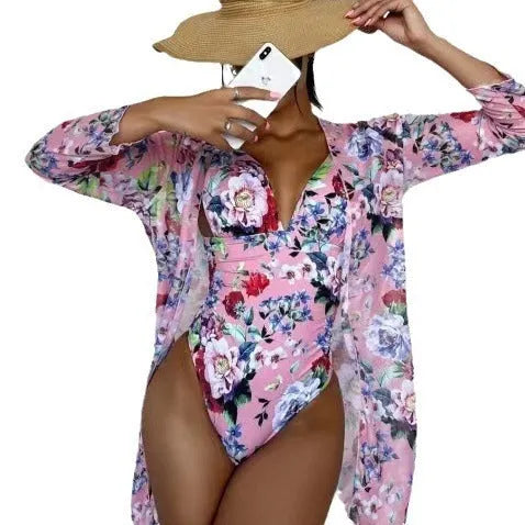 Women's floral patterned bikini and matching coat swimwear set in one of seven available colours.