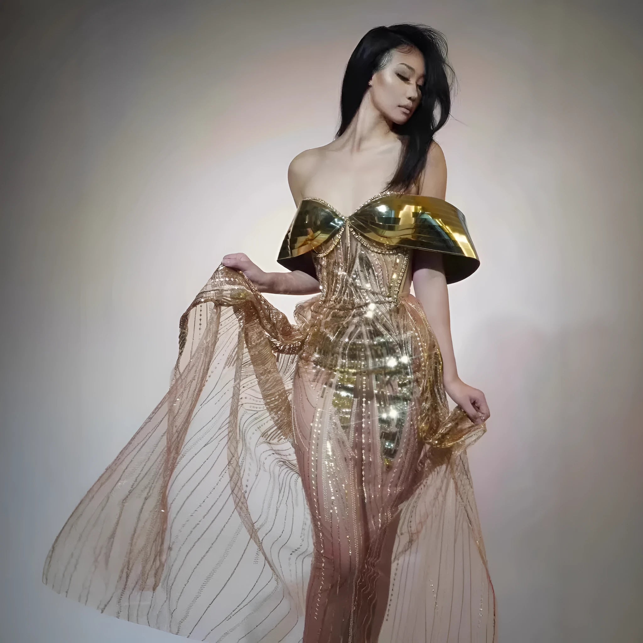 Gold strapless sequined dress with thigh-high split and tulle overlay, formal women's gown