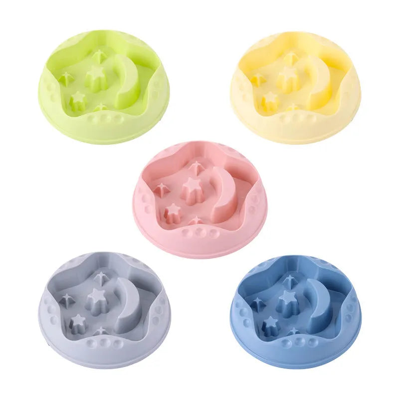 Large blue slow feeder dog bowl with raised moon and star wing patterns and a non-slip rubber base.