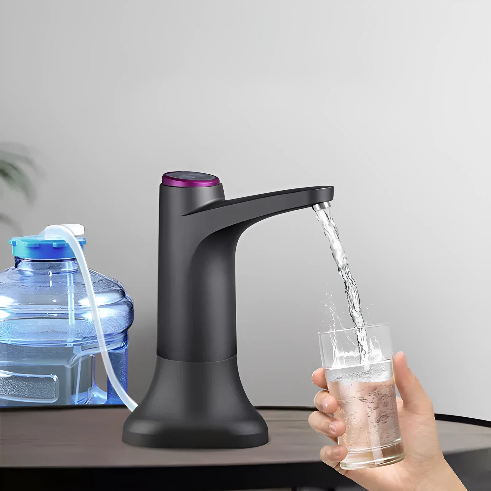Dark grey touch automatic desktop water dispenser with USB charging and 50cm water pipe on kitchen countertop