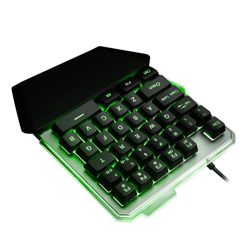 G40 Flow Colour black one-handed robotic keyboard with RGB backlit keys on a desk