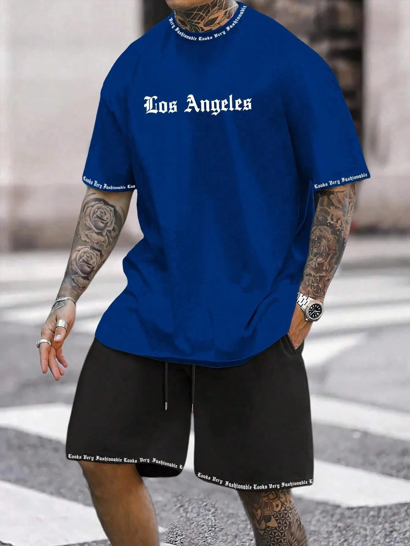 Sports style short-sleeved shirt and matching shorts set in a thin, printed fabric on a mannequin.
