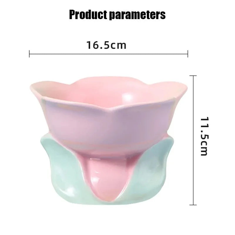 Blue ceramic raised pet bowl with floral pattern and non-slip base for cats and small dogs.
