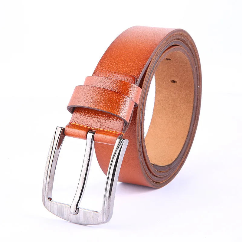 Leather pin buckle belt in black and camel colours on a plain background