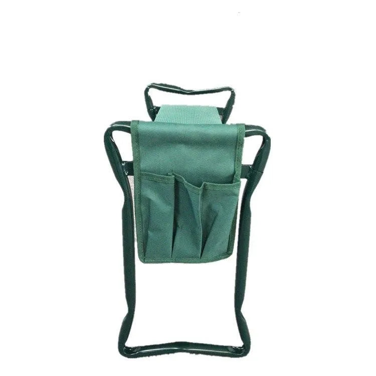 Foldable green garden kneeling bench with metal frame and two side pouches on lawn