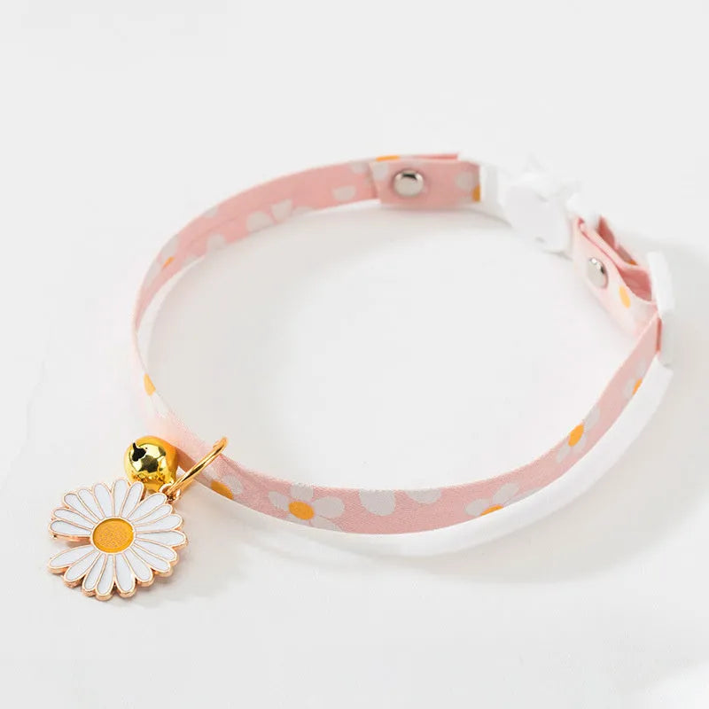 Small pet collar with bell pendant and decorative bow tie in adjustable design