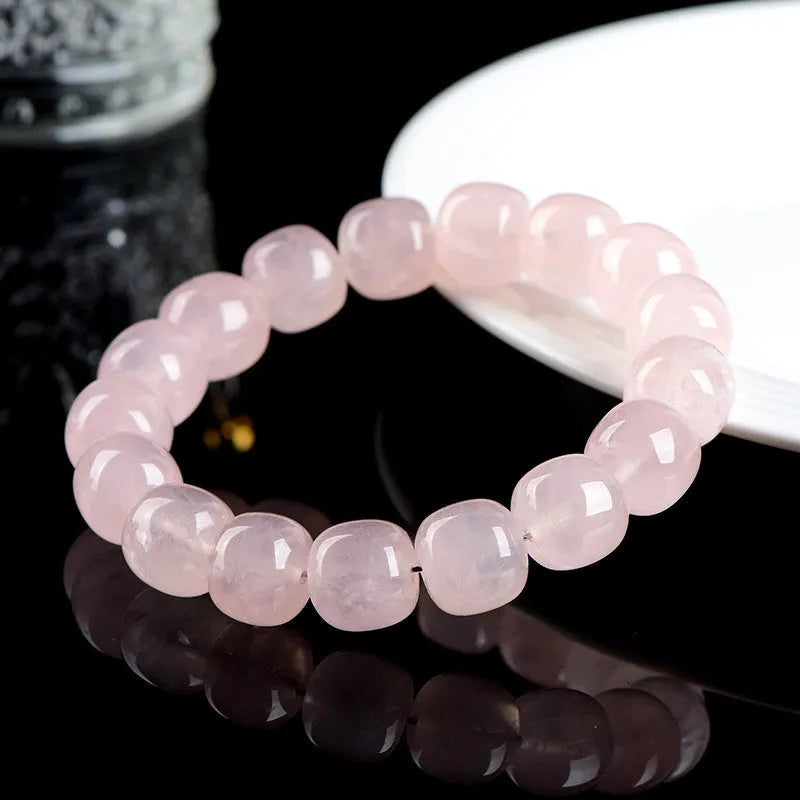 Pink natural bamboo crystal barrel bead bracelet with 11-12mm geometric beads