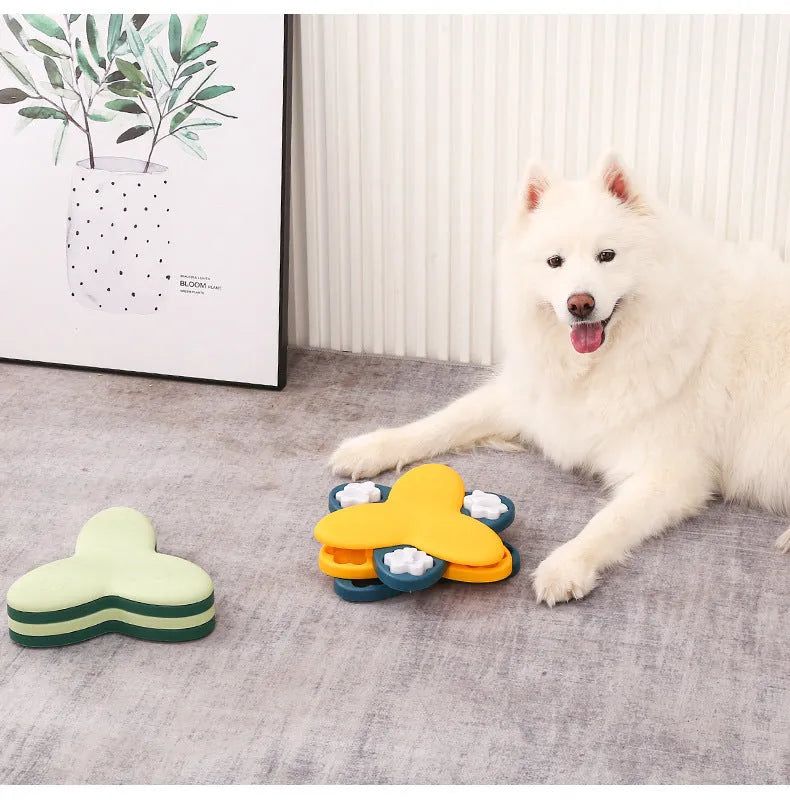 Green dog puzzle toy with bone-shaped covers showing nine compartments for treat dispensing