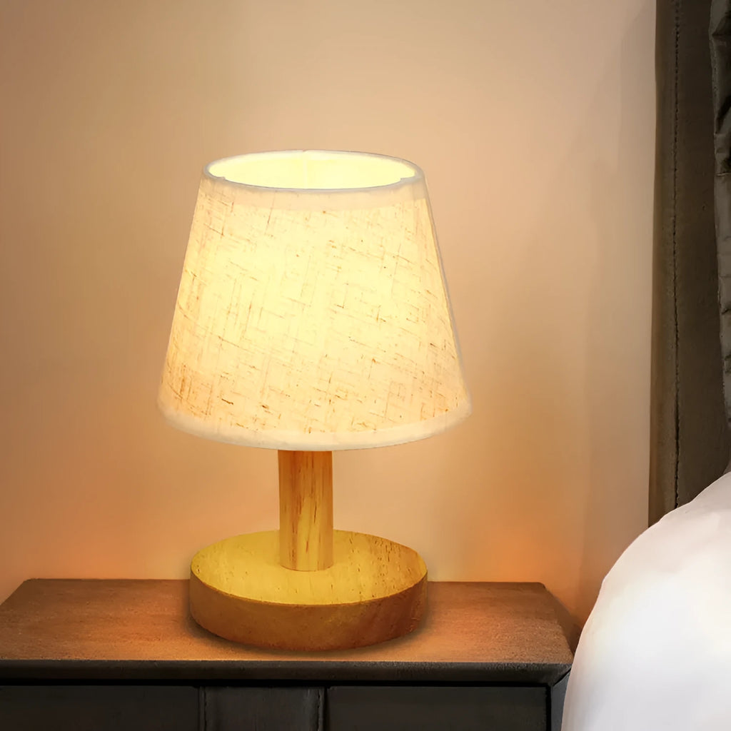 Vintage pleated table lamp with linen shade, jute trim, and bamboo holder showing three-colour dimming function